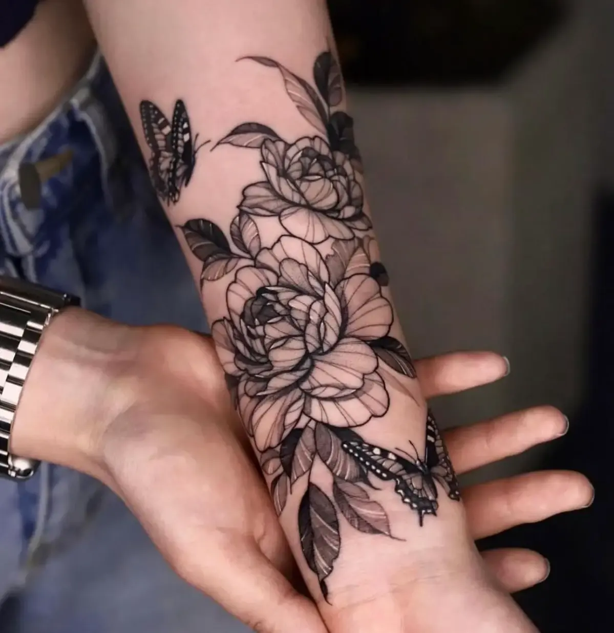 dark floral tattoo