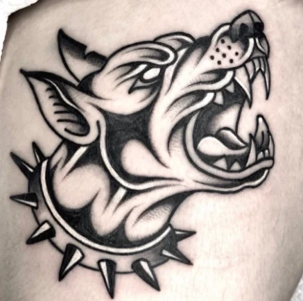 agressive dog black and white traditional tattoo